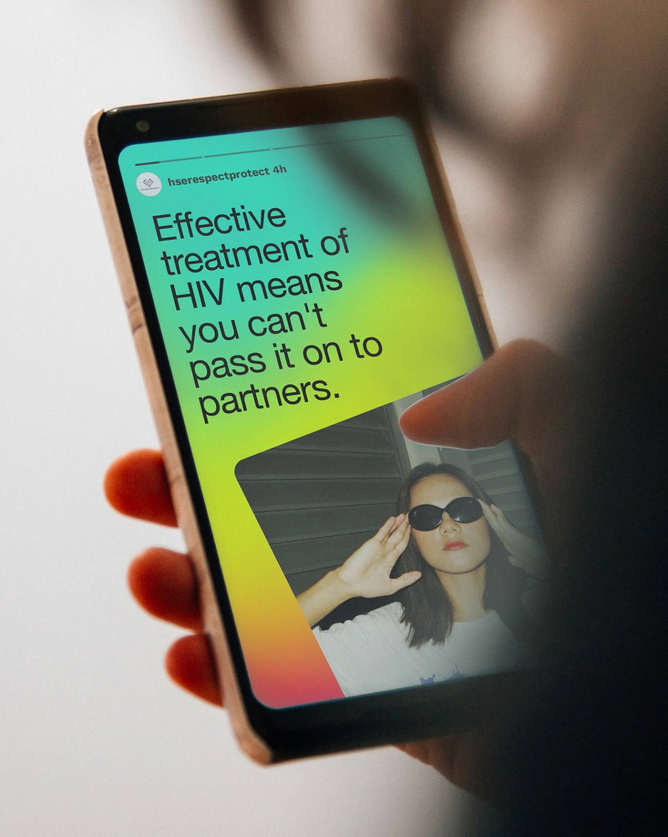 Image showing a screen that says "Effective treatment of HIV means you can't pass it to partners"