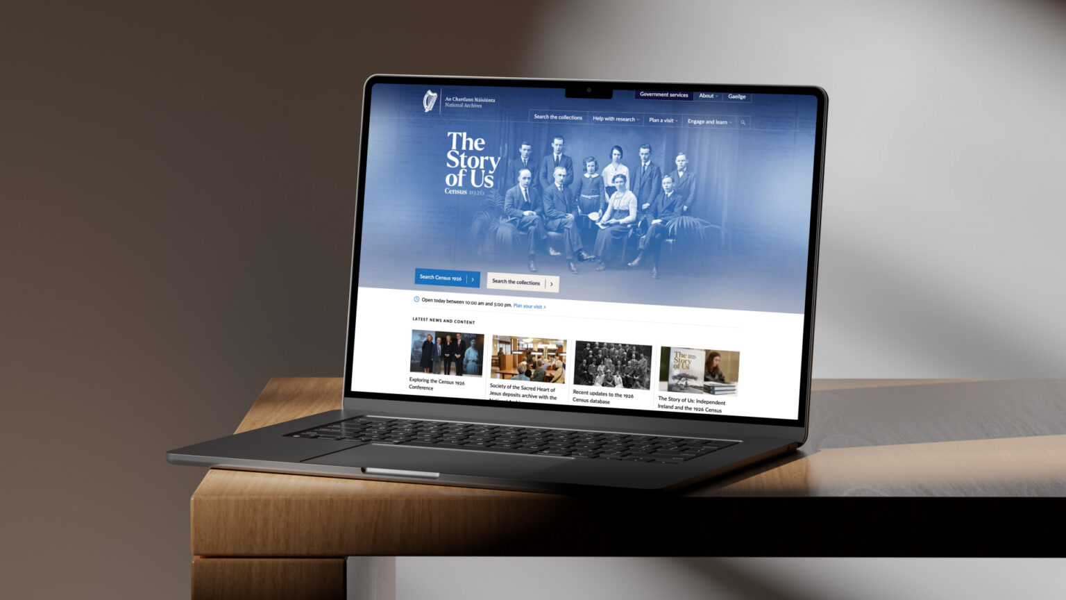 A graphic displaying a laptop and the homepage for our work on the 1926 Census site for the National Archives